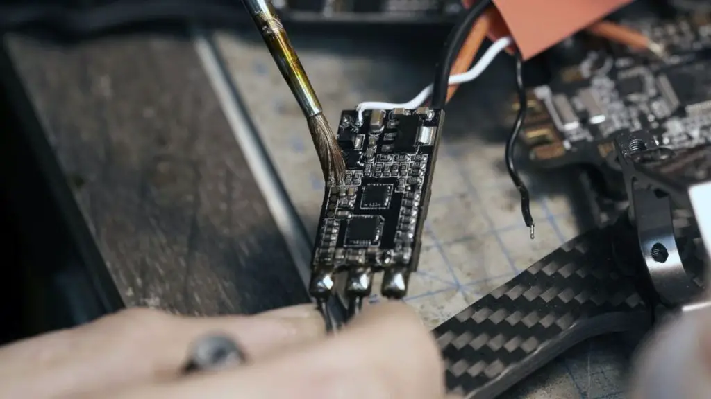 A layer of conformal coating is applied onto the ESC for waterproofing.
