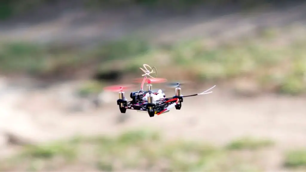 A flying FPV drone - its flight time is determined by battery capacity.